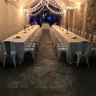 a long table set for a wedding reception