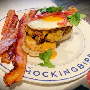 Flock Yes: Chicken Fried chicken thigh on a Buttermilk Biscuit with Chorizo Gravy, Cilantro, and a Fried Egg - 02.25.22