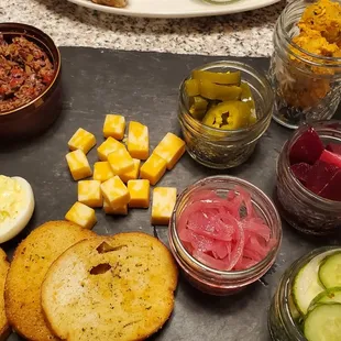 Relish tray - tapenade, fried olives, deviled eggs, pickled veggies