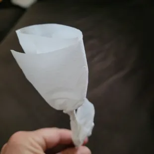 Was given 2 handmade napkin flowers by a regular