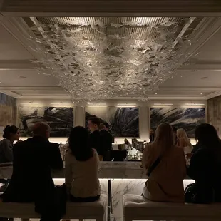 people sitting at the bar