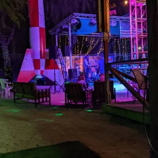 a brightly lit stage set up at night