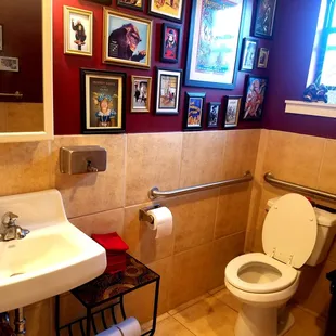 Our restroom, a gallery of fine monkey art, is always spotless.