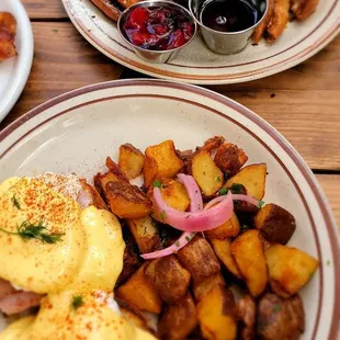 Classic Benedict with well done potatoes, Challah French toast with a side of bacon
