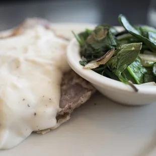 Chicken fried steak with spinach