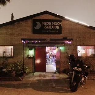 a motorcycle parked in front of a building