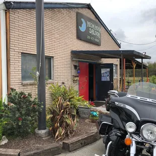 two motorcycles parked outside