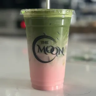 Green matcha and strawberry iced tea with coconut milk, super yummy