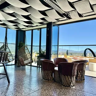 a living room with a view of the city