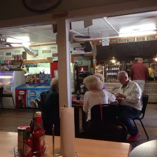 a man and a woman sitting at a table
