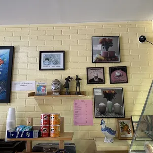 a brick wall with pictures on it