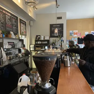 a bari serving coffee at a coffee shop