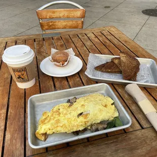 Omelette with spinach ,mushrooms and Swiss cheese.