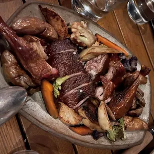 Half smoked duck with root vegetables at The Morris in San Francisco.