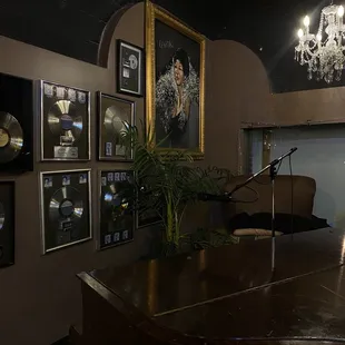 a grand piano in a dimly lit room