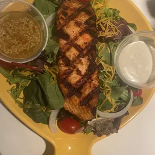 Dinner salad with grilled salmon