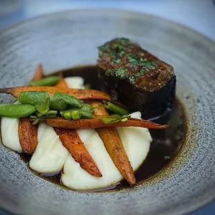 Red Wine Braised Short Rib w/Yukon Gold Mashed Potatoes, Charred Baby Carrots &amp; Sweet Peas