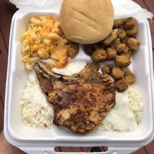 Pork Chop with Rice and Gravy, Mac and Cheese, Fried Okra and Roll, $9.99 Wednesday special with drink