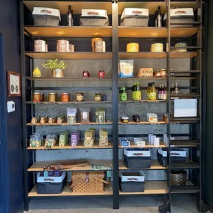 shelves of cheese and other items