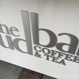 a sign for coffee and tea