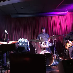 a band performing on stage