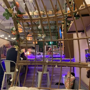 view of bar from the basket chair