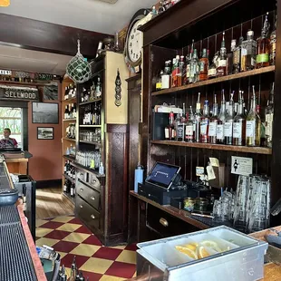 a bar with a clock on the wall