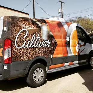 a van with coffee beans on it