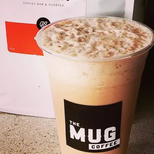 a cup of coffee on a table