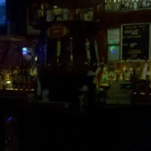 a bar with a television in the background