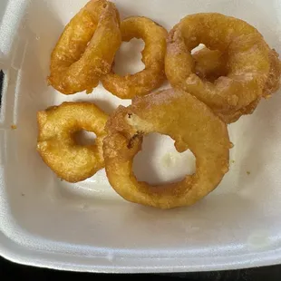$4.95 worth of onion rings.... Very good but 6 small rings for $4.95??