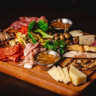 a platter of meat and cheese