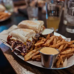 a plate of fries and a sandwich