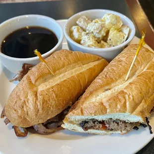 Excellent French Dip with a tasty Au Jus and potato salad.