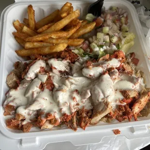 a meal in a styrofoam container