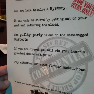 a hand holding a sign