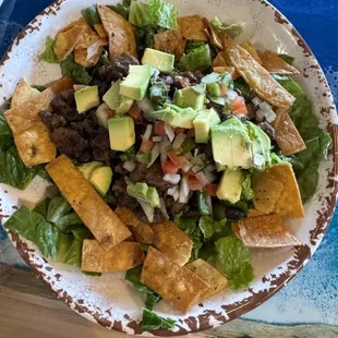 Taco bowl with asada steak.