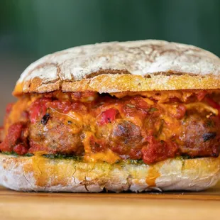 a meatball sandwich on a bun
