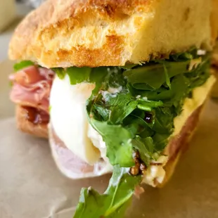 Close up of the burata and prosciutto in the Rene