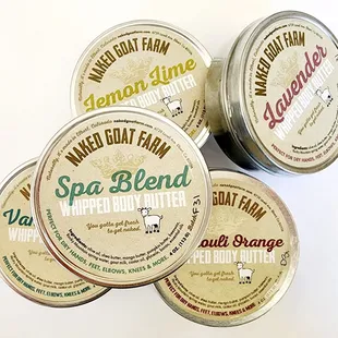 four tins of whipped body butter