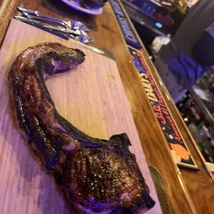 Can Can pork chop. Amazing. Not only doesn't have the center cut but pork belly on the bone.