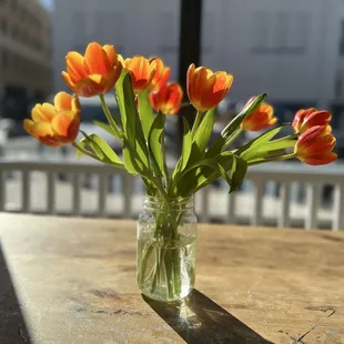 Fresh flowers in a vase on the table.
