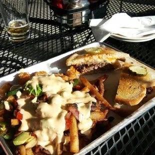 Loaded fries/ tots (yes, they let us have both!) And our burger!