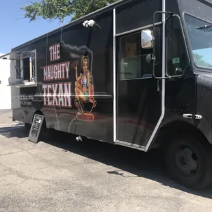 a food truck parked in a parking lot