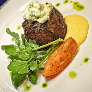 6OZ. FILET MIGNON
 Topped with Gorgonzola Butter, Grilled Tomato &amp; Hollandaise Sauce. Served with Choice of House or Caesar Salad, plus side