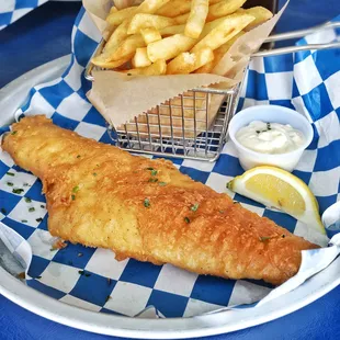 NEW ENGLAND FISH &amp; CHIPS
 Bigger is Better! Beer Battered Haddock Served with French Fries, House Tartar sauce, Malt Vinegar, and Coleslaw.