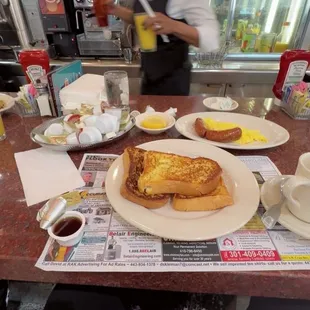Sausage, eggs, French toast.