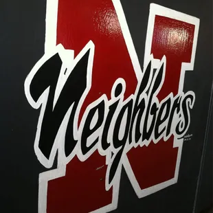 the logo on the wall