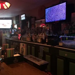 a bar with a television in the background