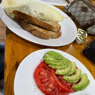 Runners Omelette with a side of sliced tomatoes and avocado